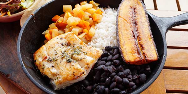 food to try in costa rica casado plate of fish rice beans and vegetables