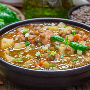 a bowl of hearty vegetable soup in Croatia