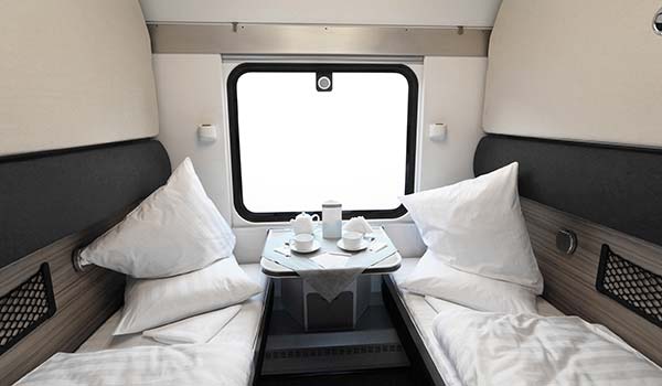 beds and coffees in a cabin on an overnight train in egypt