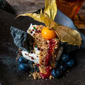 best food to try in iceland is icecream topped with fruit and honey