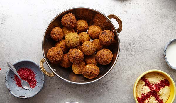 popular israeli food falafel and hummus with paprika