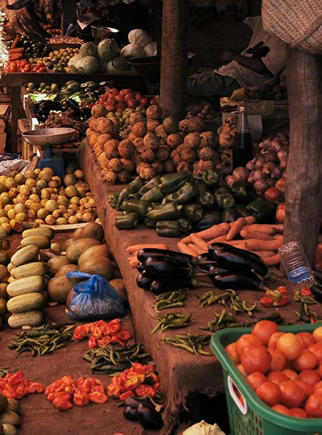 market stall in Kenya selling street food and fruits