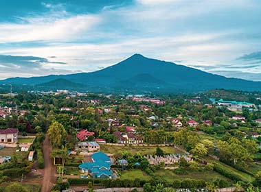 view of arusha town with mountain in background tanzania