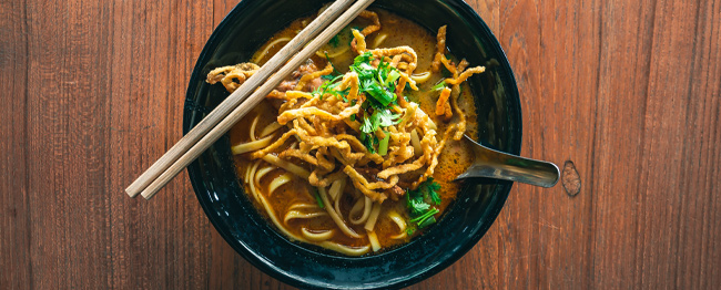 A bowl of khao soi, a northern Thai classic recipe