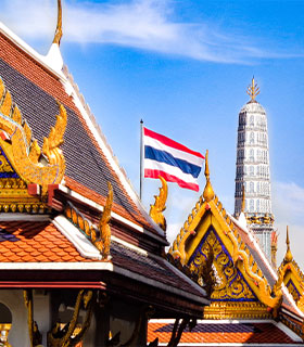 The Thai flag flying proud on the Grand Palace in Thailand