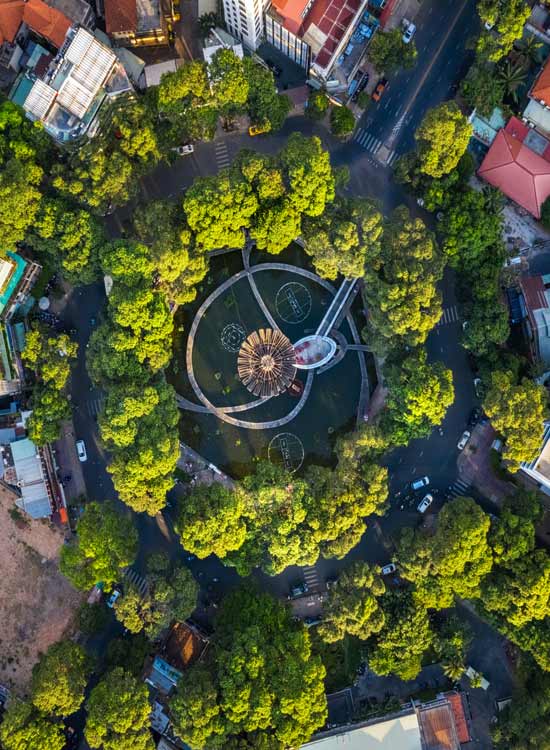 travel through ho chi minh city and visit the culturally wonderful district 3 and see the turtle lake amongst the city buidlings