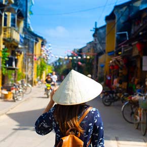 Solo traveler on a group tour in Hoi An