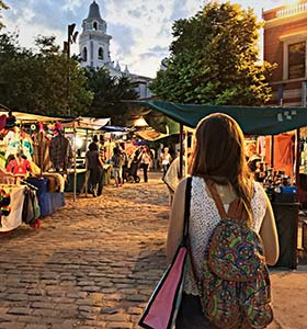 solo female traveller shopping at a market in argentina