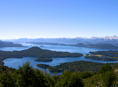 grass hills and Nahuel Huapi Lake in bariloche argentina