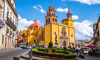 yellow colourful church cathedral in guanajuato in mexico