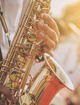 man playing the saxophone at the cape town international jazz festival