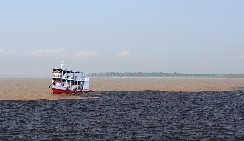 The Rio Negro meeting the Amazon River in Manaus, Brazil