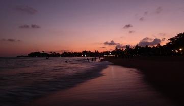 The sun setting over Unawatuna, Sri Lanka